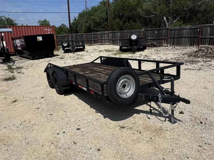 16-foot flatbed utility trailer with dual axles on the RedLine rental lot