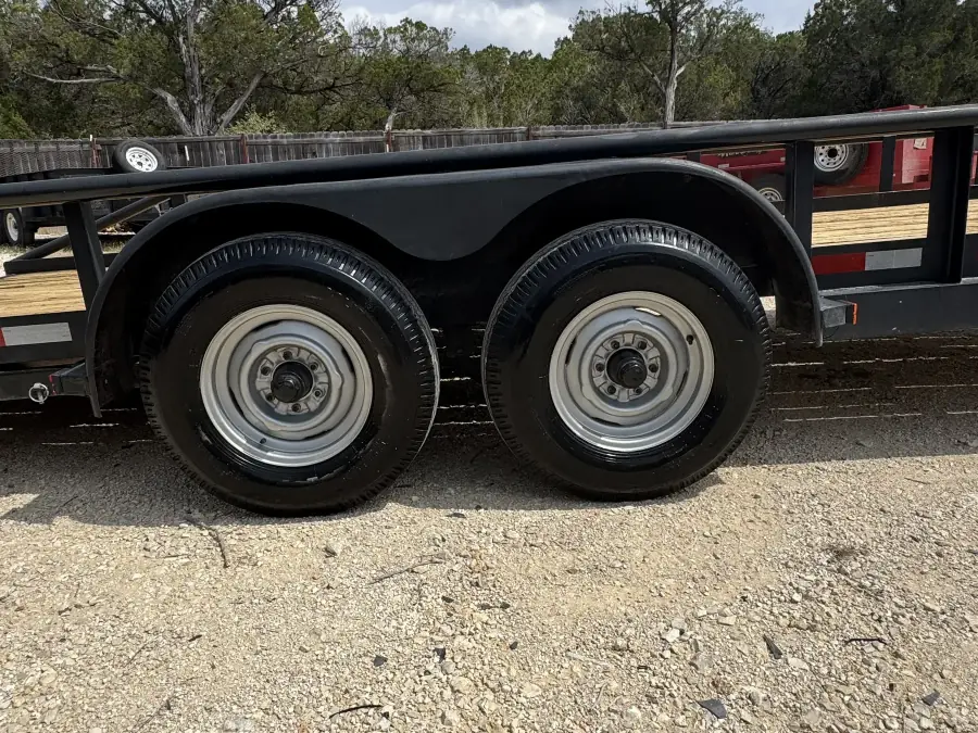 Dual wheels and axle close-up on the RedLine 20-foot trailer